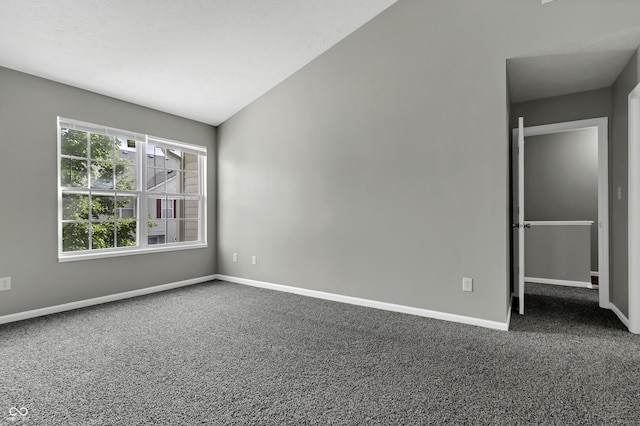 4652 Kimmeridge Ln, Indianapolis, IN 46254 - empty room with carpet flooring and vaulted ceiling