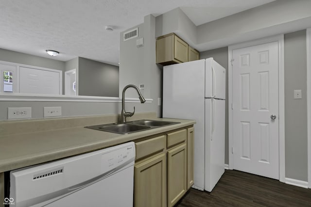 4652 Kimmeridge Ln, Indianapolis, IN 46254 - kitchen featuring white appliances, dark wood finished floors, a textured ceiling, and light countertops