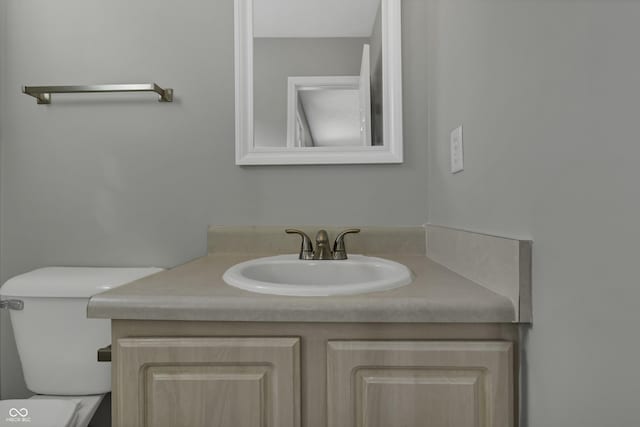 4652 Kimmeridge Ln, Indianapolis, IN 46254 - half bathroom featuring toilet and vanity