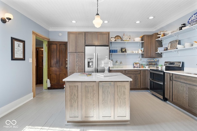 kitchen featuring crown molding, pendant lighting, a center island, and stainless steel appliances