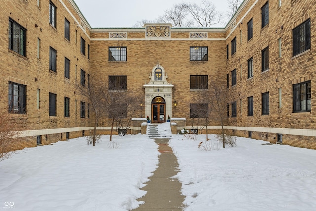 view of snow covered property