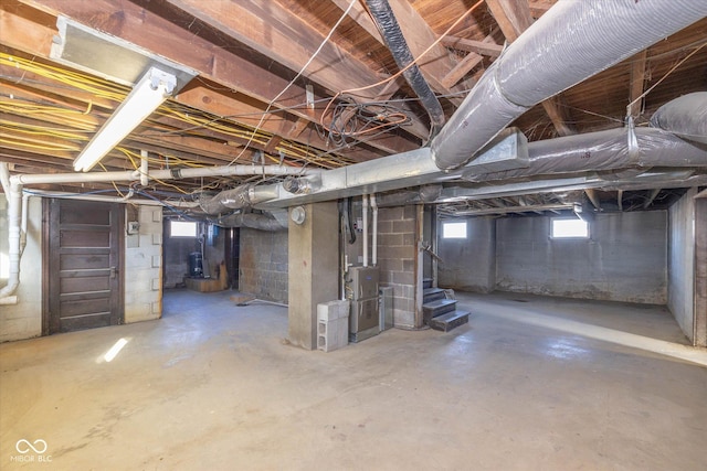 basement featuring plenty of natural light