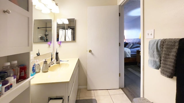 bathroom with vanity and tile patterned floors