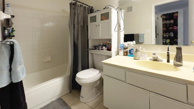 full bathroom featuring tile patterned flooring, shower / bath combination with curtain, toilet, and vanity