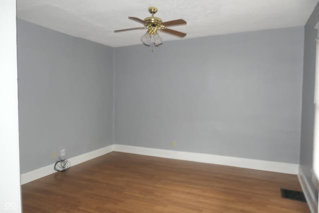 unfurnished room featuring ceiling fan and wood-type flooring