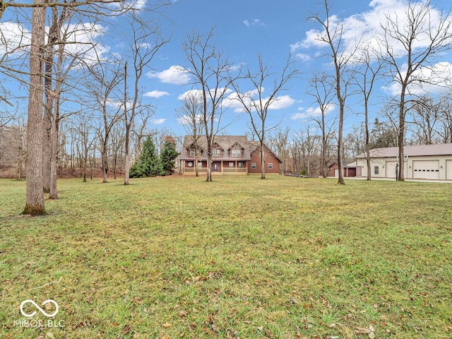 view of yard featuring a garage