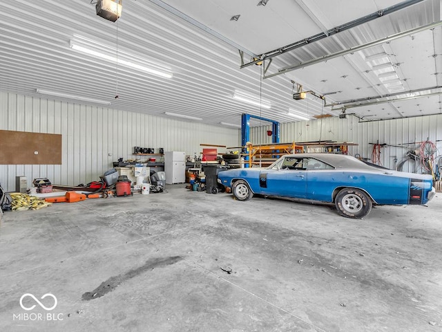 garage featuring a garage door opener