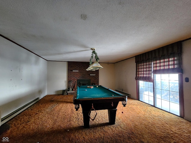 playroom with baseboard heating, billiards, a textured ceiling, a fireplace, and carpet