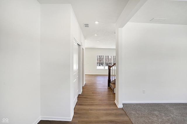 hall featuring dark hardwood / wood-style floors