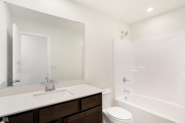 full bathroom featuring vanity, toilet, and shower / tub combination