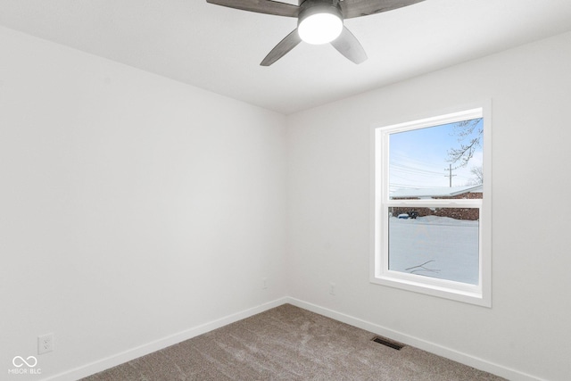 unfurnished room featuring carpet floors and ceiling fan