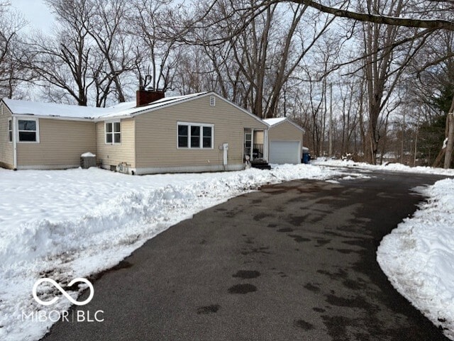 exterior space with a garage