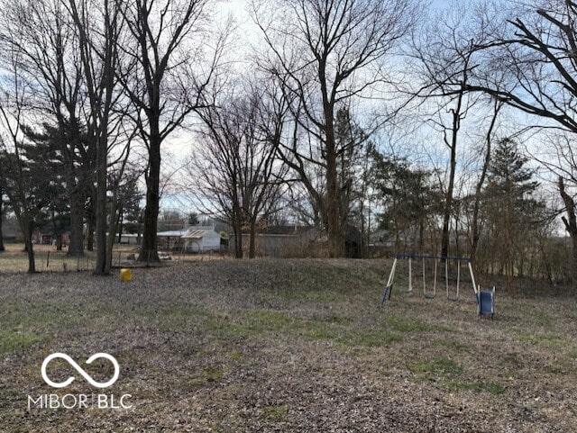 view of yard with a playground