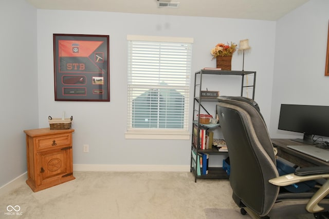 home office with light colored carpet