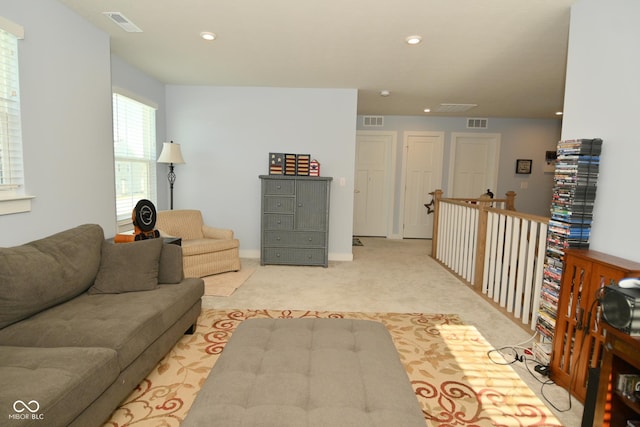 living room featuring light carpet