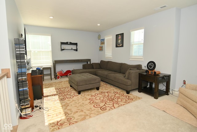 living room with light colored carpet