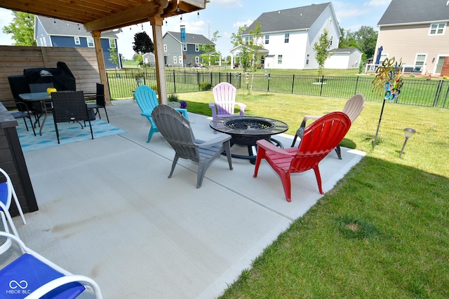 view of patio featuring an outdoor fire pit