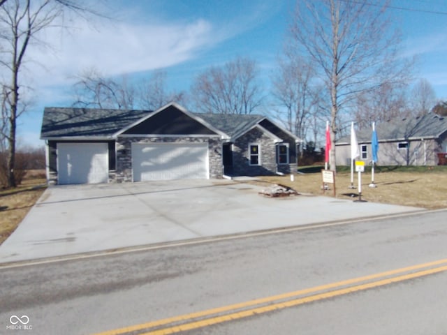 single story home featuring a garage