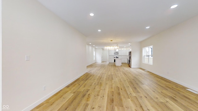 unfurnished living room with light hardwood / wood-style floors