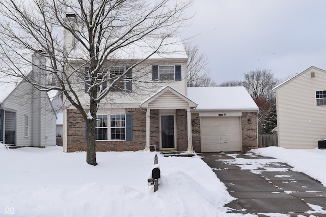 view of front of property featuring a garage