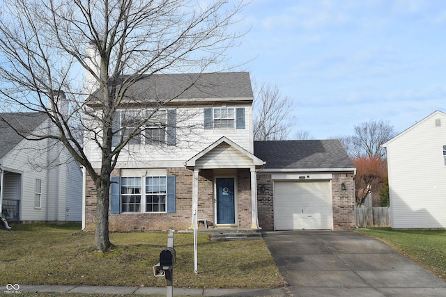 view of front of home with a garage and a front yard