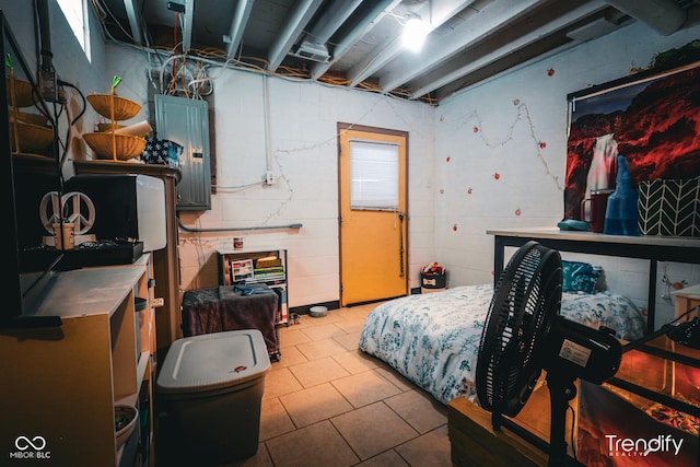 bedroom with tile patterned flooring and electric panel