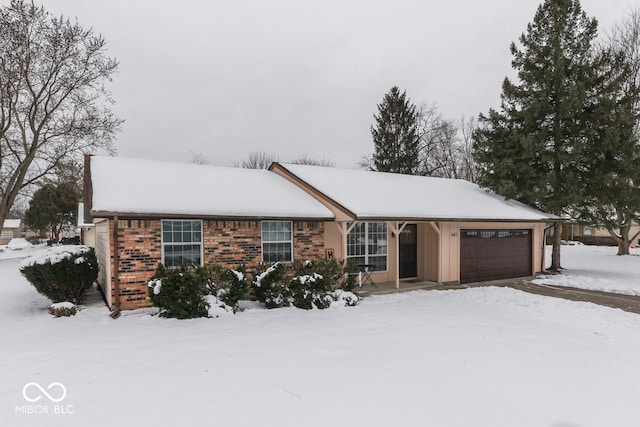 single story home with a garage