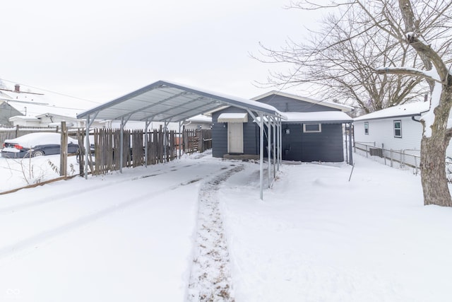 exterior space featuring a carport