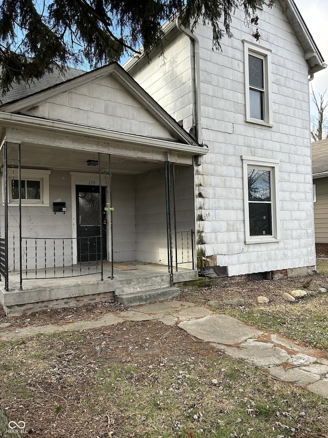 view of front of property featuring covered porch