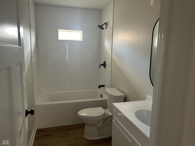 full bathroom featuring shower / tub combination, vanity, hardwood / wood-style flooring, and toilet