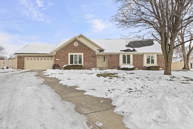 single story home featuring a garage