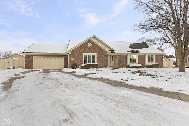 ranch-style house featuring a garage