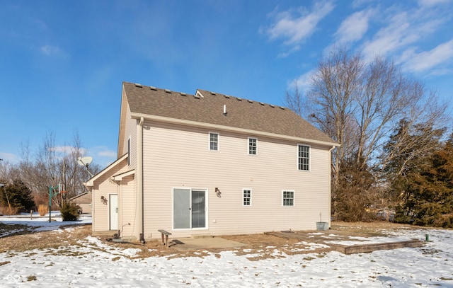 view of snow covered house