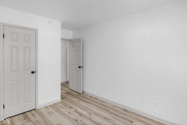 unfurnished bedroom featuring light hardwood / wood-style floors