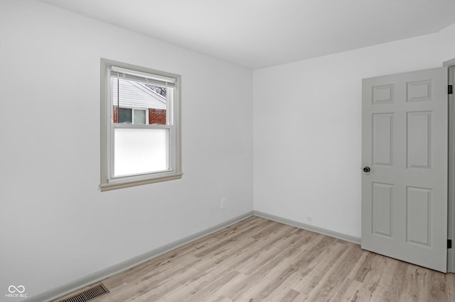 empty room featuring light hardwood / wood-style floors