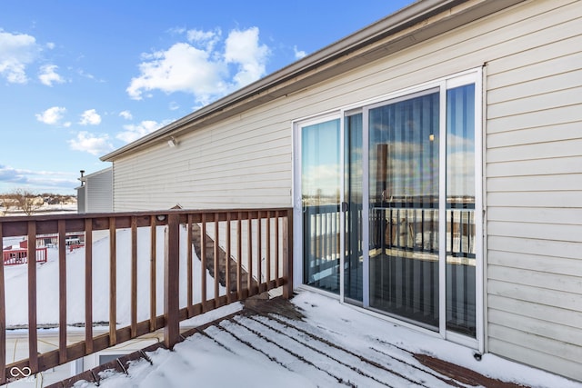 view of snow covered deck