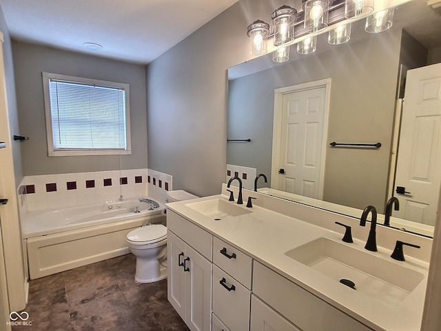 bathroom with vanity, toilet, and a bathtub