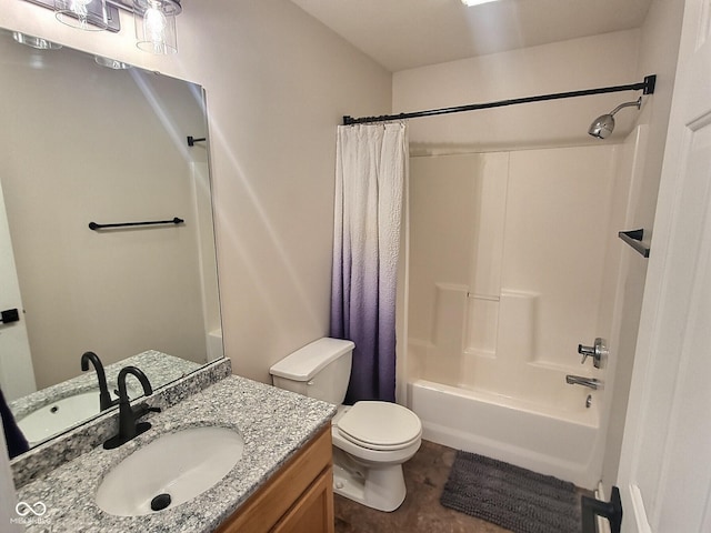 full bathroom with vanity, shower / bath combo, and toilet