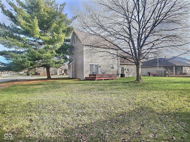 view of yard with a wooden deck