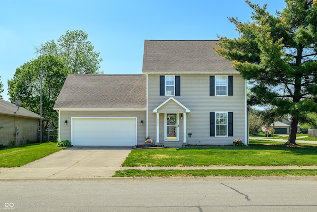 colonial-style house with concrete driveway, an attached garage, and a front yard