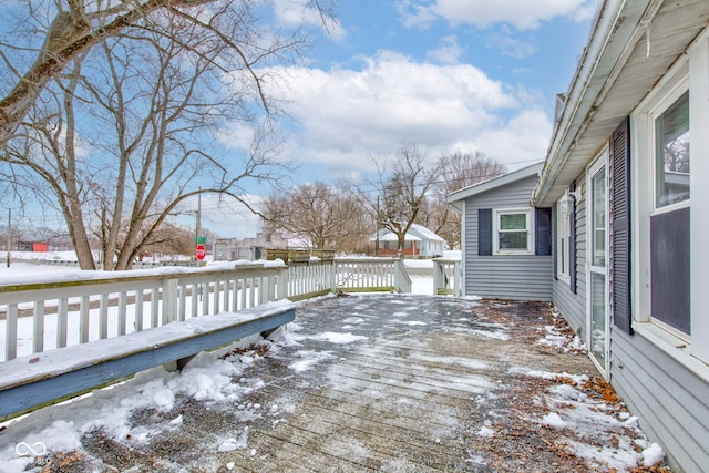 view of snow covered deck