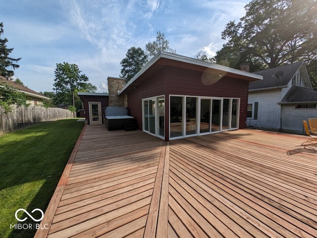 wooden deck with a lawn