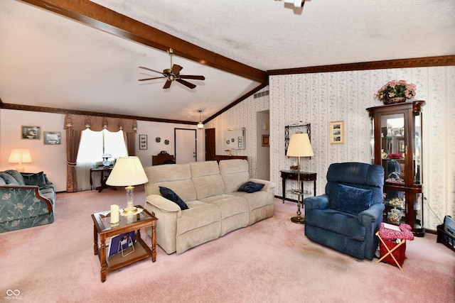 living room featuring vaulted ceiling with beams, ceiling fan, carpet, and ornamental molding