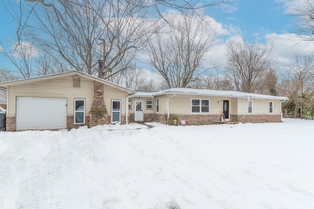 single story home featuring a garage