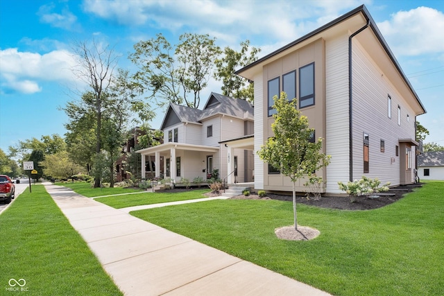 view of front of home featuring a porch and a front yard