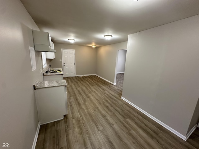 interior space with hardwood / wood-style floors