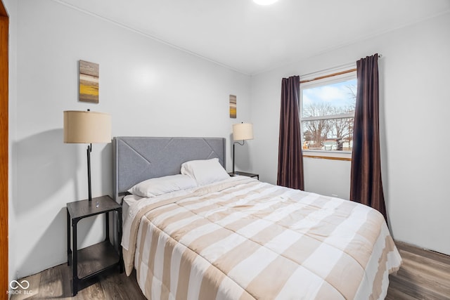 bedroom featuring wood-type flooring