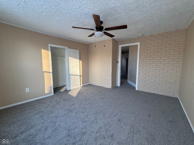 unfurnished bedroom with ceiling fan, a closet, carpet, and a textured ceiling