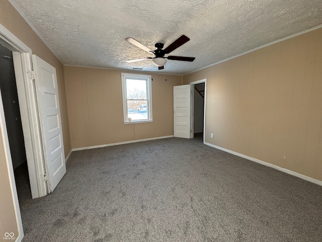 unfurnished bedroom with a textured ceiling, ceiling fan, and carpet flooring