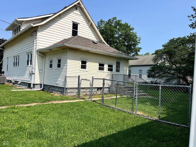 325 S Market St, Thorntown, IN 46071 - back of property with cooling unit and a gate